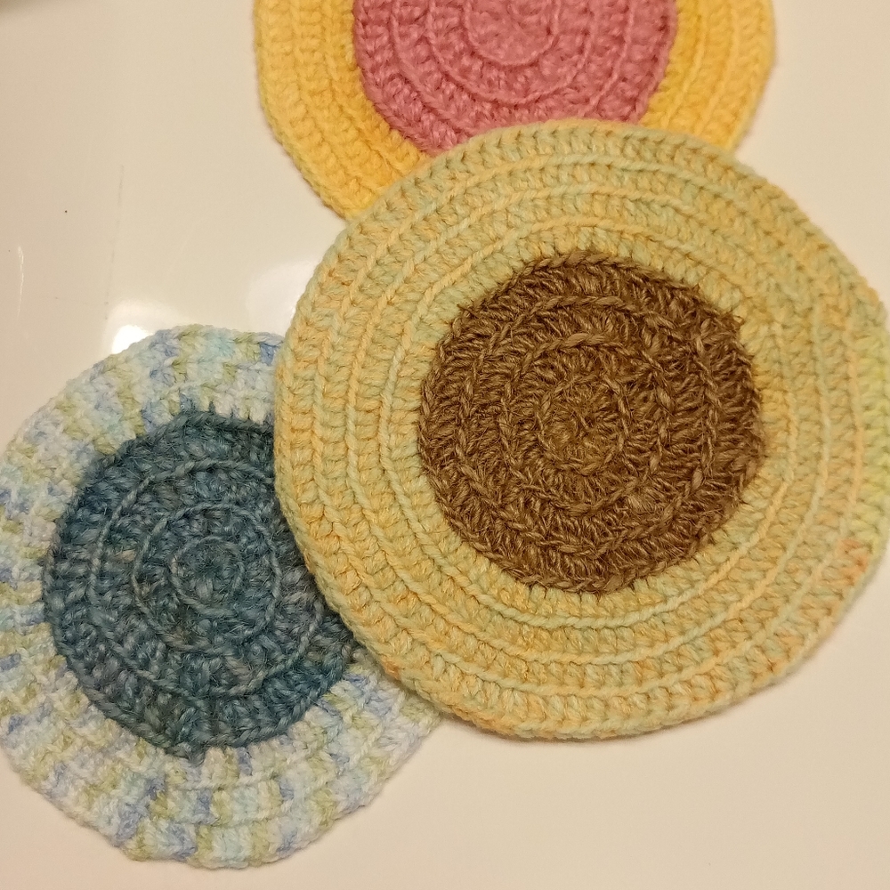 HAND CROCHETED NATURAL AND PASTEL COASTERS